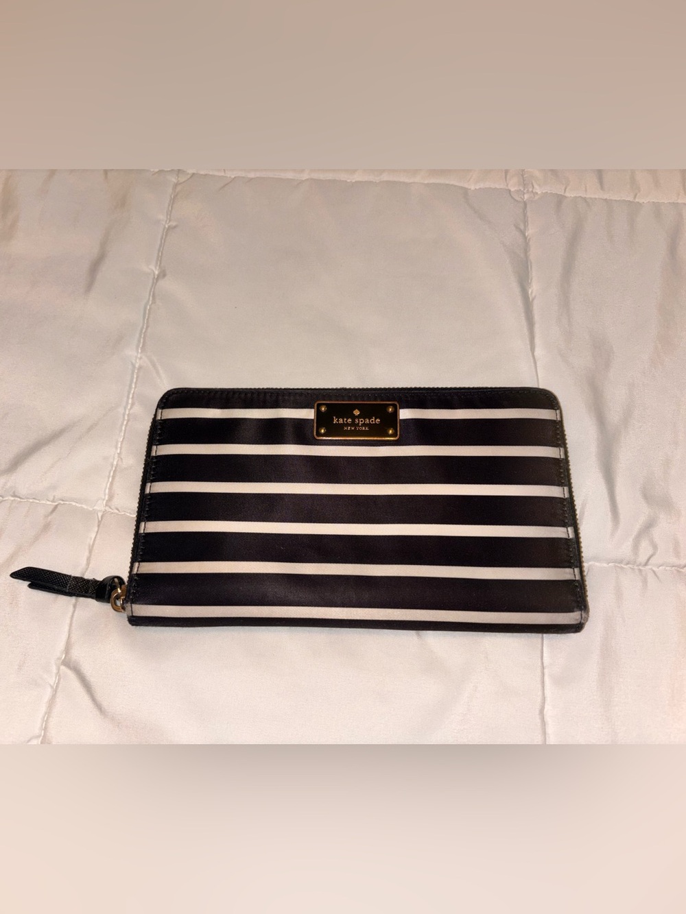 kate spade Black and White Striped Zip Wristlet with Gold Plaque